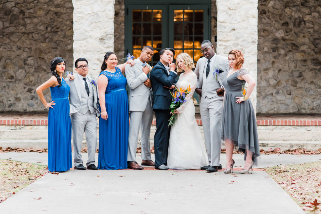 Casual photo of newlyweds with the bridal party outside of the Alachua Woman's Club in Florida 
Photo by: Black Tie & Co. (www.btcweddings.com)
