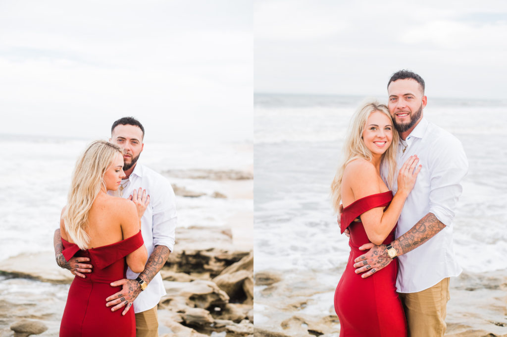 bride and groom take photos on beach, she wears a red off the shoulder dress. Palm coast florida
photo by Chabeli Woolsey of Black Tie & Co www.btcweddings.com
